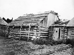 ALASKA: LOG CABIN, c1899. Log cabins in Kodiak, Alaska. Photograph by Edward Curtis ALASKA: LOG CABIN, c1899. Log cabins in Kodiak, Alaska. Photograph by Edward Curtis