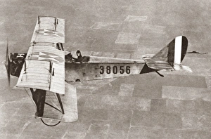 American aviator flying a biplane bomber over Ellington Field, Texas. Photograph, c1917 American aviator flying a biplane bomber over Ellington Field, Texas. Photograph, c1917