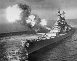 The battleship U.S.S. Missouri bombards Chong Ji, Korea, with 16-inch guns in October 1950