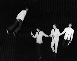 THE BEATLES, 1964. The Beatles fly above the stage during a rehearsal for the Night of THE BEATLES, 1964. The Beatles fly above the stage during a rehearsal for the Night of