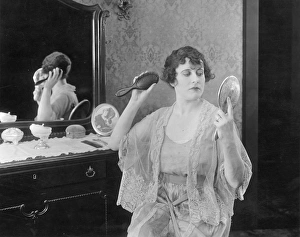 BEDROOM SCENE, 1920s. A silent movie still, 1920s BEDROOM SCENE, 1920s. A silent movie still, 1920s