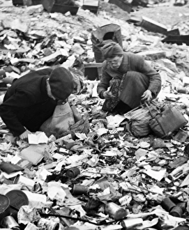 BERLIN, 1945. Women searching for food in a garbage dump in Berlin, Germany BERLIN, 1945. Women searching for food in a garbage dump in Berlin, Germany