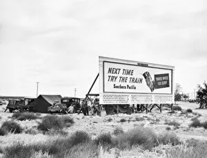 Images Dated 29th December 2006: BILLBOARD CAMP, 1938. Three families camped behind a Southern Pacific Railway billboard on U.S
