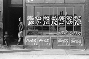 BUTCHER SHOP, c1939. Exterior of a butcher shop, probably Chicago, Illinois. Photograph BUTCHER SHOP, c1939. Exterior of a butcher shop, probably Chicago, Illinois. Photograph