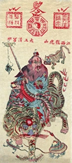 A Chinese wiseman holding a sword and riding on the back of a tiger A Chinese wiseman holding a sword and riding on the back of a tiger