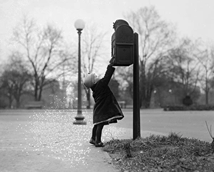 CHRISTMAS, 1920. Child mailing a letter to Santa Claus, United States. Photograph CHRISTMAS, 1920. Child mailing a letter to Santa Claus, United States. Photograph