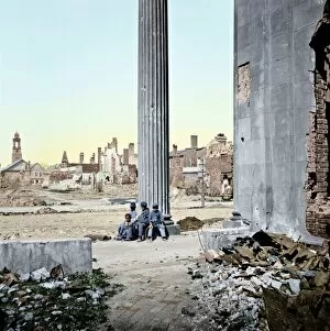 CIVIL WAR: CHARLESTON, 1865. Children sitting near ruined buildings and the porch of the Circular Church in Charleston