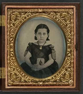 Images Dated 14th May 2012: CIVIL WAR: MOURNING, c1865. Portrait of a girl wearing a mourning dress, holding