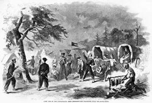 CONFEDERATE CAMP, 1861. Confederate troops from Mississippi practicing with the Bowie knife in camp