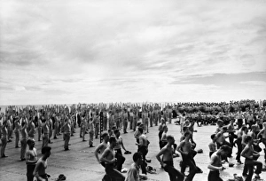 The crew of the aircraft carrier USS Lexington exercising on the flight deck during World The crew of the aircraft carrier USS Lexington exercising on the flight deck during World
