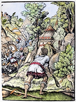 DAVID AND GOLIATH. David prepares to hurl his stone at Goliath, the Philistine warrior DAVID AND GOLIATH. David prepares to hurl his stone at Goliath, the Philistine warrior
