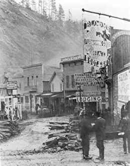 DEADWOOD, SOUTH DAKOTA. Wall Street, following Snaky Gulch bottom, in the frontier town of Deadwood, 1877