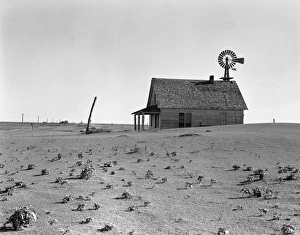 DUST BOWL, 1938. Farmhouse north of Dalhart, Texas DUST BOWL, 1938. Farmhouse north of Dalhart, Texas