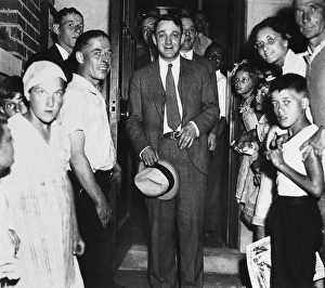DUTCH SCHULTZ (1902-1935). Originally, Arthur Flegenheimer. American gangster. Photographed at a courthouse in Malone, New York, after being acquitted of tax evasion, 1935 DUTCH SCHULTZ (1902-1935). Originally, Arthur Flegenheimer. American gangster. Photographed at a courthouse in Malone, New York, after being acquitted of tax evasion, 1935