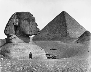 EGYPT: SPHINX AND PYRAMID. A view of the Great Sphinx at Giza, Egypt, partially excavated EGYPT: SPHINX AND PYRAMID. A view of the Great Sphinx at Giza, Egypt, partially excavated