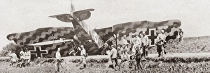 An elaborately camouflaged German fighter plane brought down by a French Canon de 75 An elaborately camouflaged German fighter plane brought down by a French Canon de 75