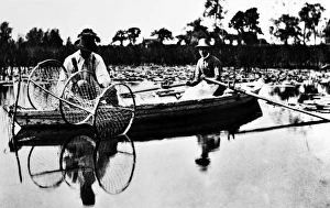 ENGLAND: FISHING, 1886. Setting the bow net. Platinotype photograph by Peter Henry Emerson ENGLAND: FISHING, 1886. Setting the bow net. Platinotype photograph by Peter Henry Emerson