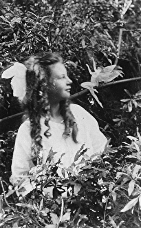 FAIRY HOAX, 1920. Frances Griffiths and a leaping fairy, in a photograph made in FAIRY HOAX, 1920. Frances Griffiths and a leaping fairy, in a photograph made in