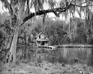 FLORIDA: DE LEON SPRINGS. Cottage on a lake at De Leon Springs, Florida. Photograph FLORIDA: DE LEON SPRINGS. Cottage on a lake at De Leon Springs, Florida. Photograph