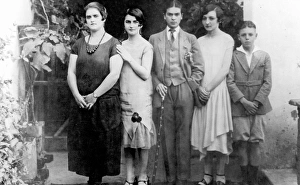 FRIDA KAHLO (1907-1954). Mexican artist. Kahlo dressed in mens clothing (center) FRIDA KAHLO (1907-1954). Mexican artist. Kahlo dressed in mens clothing (center)