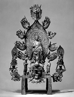 Gilt bronze altarpiece of Buddha Maitreya surrounded by attendants and celestial beings Gilt bronze altarpiece of Buddha Maitreya surrounded by attendants and celestial beings