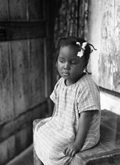 GIRL, c1920. Portrait of a girl, either in Cuba or Guatemala. Photograph by Arnold Genthe GIRL, c1920. Portrait of a girl, either in Cuba or Guatemala. Photograph by Arnold Genthe