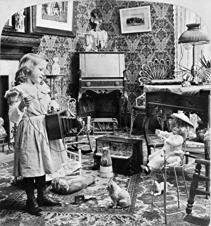 GIRL WITH TOYS, c1902. A girl photographing her toys. Stereograph, c1902 GIRL WITH TOYS, c1902. A girl photographing her toys. Stereograph, c1902