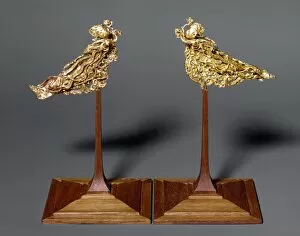 Gold headdress ornaments in the form of a pair of apsarases (angels of Buddhist mythology)