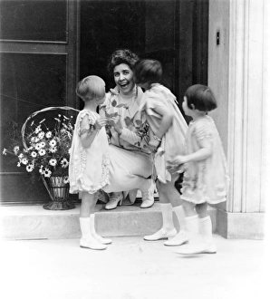 GRACE ANNA COOLIDGE (1879-1957). Wife of President Calvin Coolidge, receiving flowers GRACE ANNA COOLIDGE (1879-1957). Wife of President Calvin Coolidge, receiving flowers