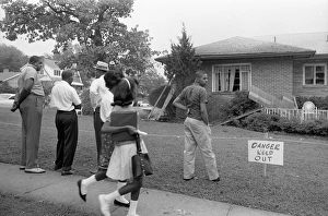 Group of African Americans viewing the bomb-damaged home of Arthur Shores, NAACP attorney Group of African Americans viewing the bomb-damaged home of Arthur Shores, NAACP attorney