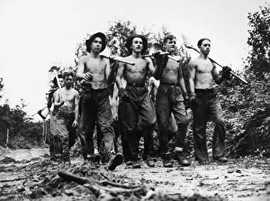 A group of Civilian Conservation Corps workers from Camp Tomahawk, Wisconsin, with shovels A group of Civilian Conservation Corps workers from Camp Tomahawk, Wisconsin, with shovels