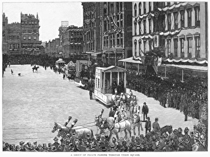 A group of floats passing through Union Square at the Industrial Parade in New York City A group of floats passing through Union Square at the Industrial Parade in New York City