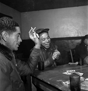 Group of Tuskegee Airmen playing cards in the officers club at Ramitelli Airfield, Italy Group of Tuskegee Airmen playing cards in the officers club at Ramitelli Airfield, Italy