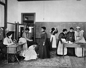 HAMPTON INSTITUTE, 1899. A class in dress-making HAMPTON INSTITUTE, 1899. A class in dress-making