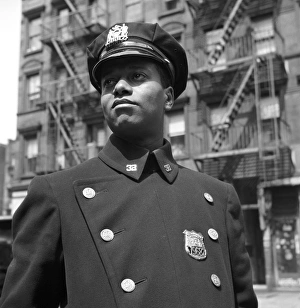 HARLEM: POLICEMAN, 1943. A policeman from Harlem, New York. Photograph by Gordon Parks HARLEM: POLICEMAN, 1943. A policeman from Harlem, New York. Photograph by Gordon Parks