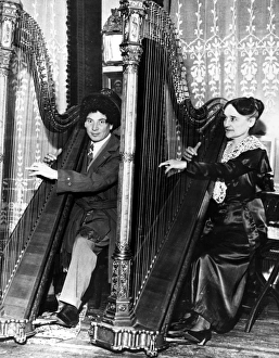 HARPO MARX (1888-1964). American comedian and actor. Photographed with French harpist HARPO MARX (1888-1964). American comedian and actor. Photographed with French harpist