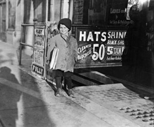 HINE: CHILD LABOR, 1917. Five-year-old newsboy, Hymie Miller, at work in Oklahoma City HINE: CHILD LABOR, 1917. Five-year-old newsboy, Hymie Miller, at work in Oklahoma City