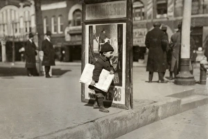 HINE: NEWSBOY, 1917. Five-year-old newsboy, Ernest Chester, at work in Oklahoma City HINE: NEWSBOY, 1917. Five-year-old newsboy, Ernest Chester, at work in Oklahoma City