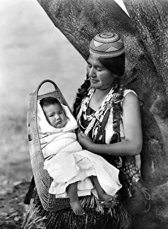 HUPA MOTHER, c1923. A Hupa mother with her child. Photographed in California by Edward HUPA MOTHER, c1923. A Hupa mother with her child. Photographed in California by Edward