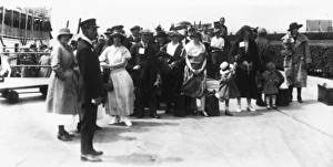 IMMIGRANTS, c1920. Their first moment on American soil IMMIGRANTS, c1920. Their first moment on American soil