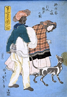 JAPAN: WOMAN WITH DOG. A French woman walking her dog, accompanied by a dark-skinned man JAPAN: WOMAN WITH DOG. A French woman walking her dog, accompanied by a dark-skinned man