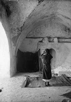 JERUSALEM: MIHRAB. A man praying in a mihrab in Sharafat, East Jerusalem. Photograph JERUSALEM: MIHRAB. A man praying in a mihrab in Sharafat, East Jerusalem. Photograph