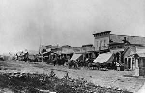 KANSAS: DODGE CITY, 1878. Front Street in Dodge City, Kansas. Photograph, 1878 KANSAS: DODGE CITY, 1878. Front Street in Dodge City, Kansas. Photograph, 1878