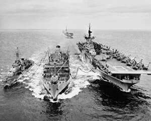 1953 Collection: KOREAN WAR: SHIP REFUELING. The destroyer USS Shelton and the aircraft carrier USS Antietam