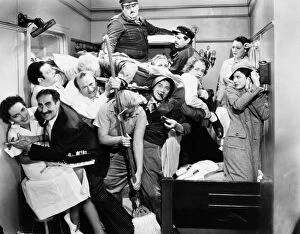 Cabin Gallery: THE MARX BROTHERS, 1935. Some of the ships crew join the Marx Brothers in their cabin in A Night at the Opera