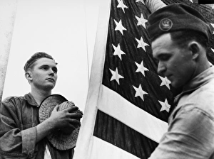 A member of the Civilian Conservation Corps saluting the flag. Photograph, c1940 A member of the Civilian Conservation Corps saluting the flag. Photograph, c1940