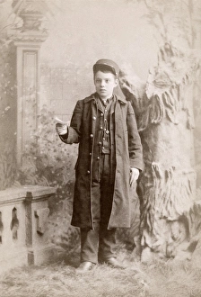 MESSENGER BOY, c1889. Portrait of a messenger boy, photographed by the Shouldis MESSENGER BOY, c1889. Portrait of a messenger boy, photographed by the Shouldis