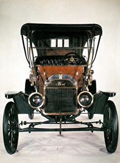 Model T Gallery: MODEL T FORD, 1910. Model T Ford with brass radiator, head lamps and fittings