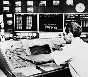 Monitoring tracking information on Skylab, the U.S. space station, from the North American Air Defense Command (NORAD)