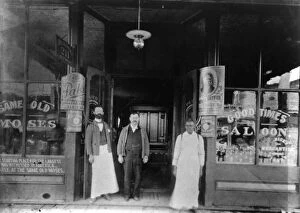 Moses Weinberger (center) with bartenders Mack O'Brien (left) and Ike Reed at the entrance to the Same Old Moses